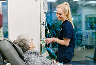 Cancer Centre Nurse and patient